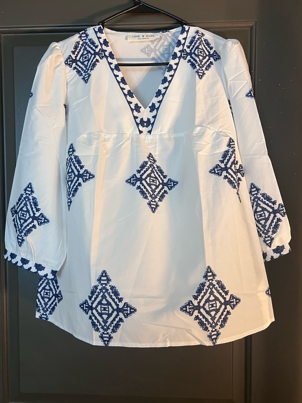 White V-Neck Navy Geometric Peasant Top